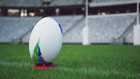 rugby ball on a grass in the stadium 4k