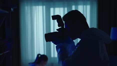 silhouette of photographers in a studio