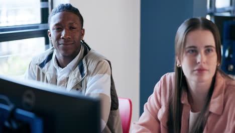 students in a classroom using computers