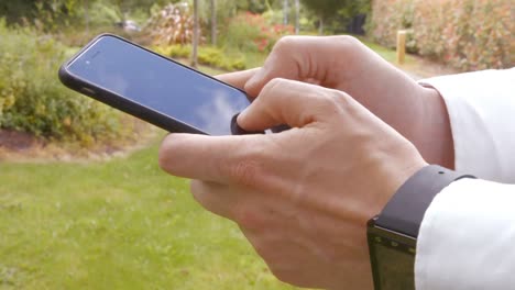 close up of man using a smartphone