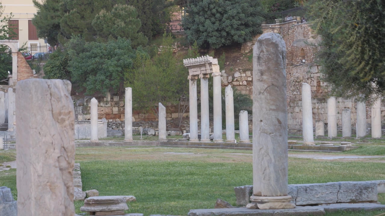 Ancient Roman Forum, a historic landmark and archaeological site in Athens, Greece. panning shot