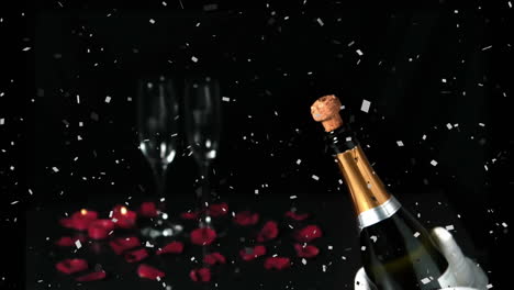 animation of confetti over man opening champagne on black background
