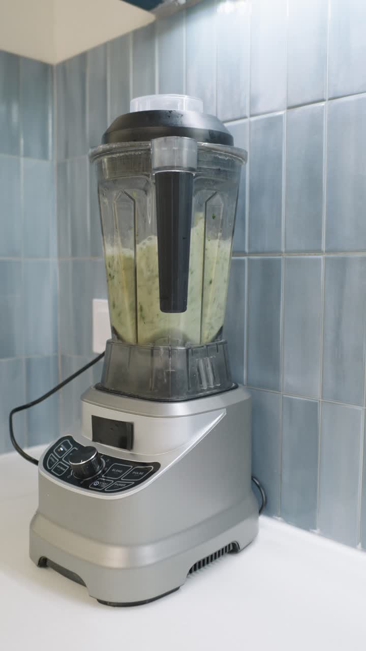 Blending food in a kitchen