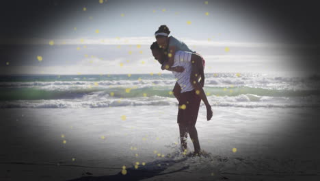 couple enjoying piggyback ride on beach with glowing particles animation
