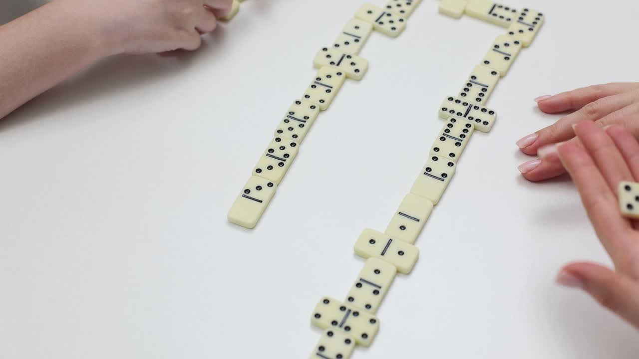 Playing Dominoes