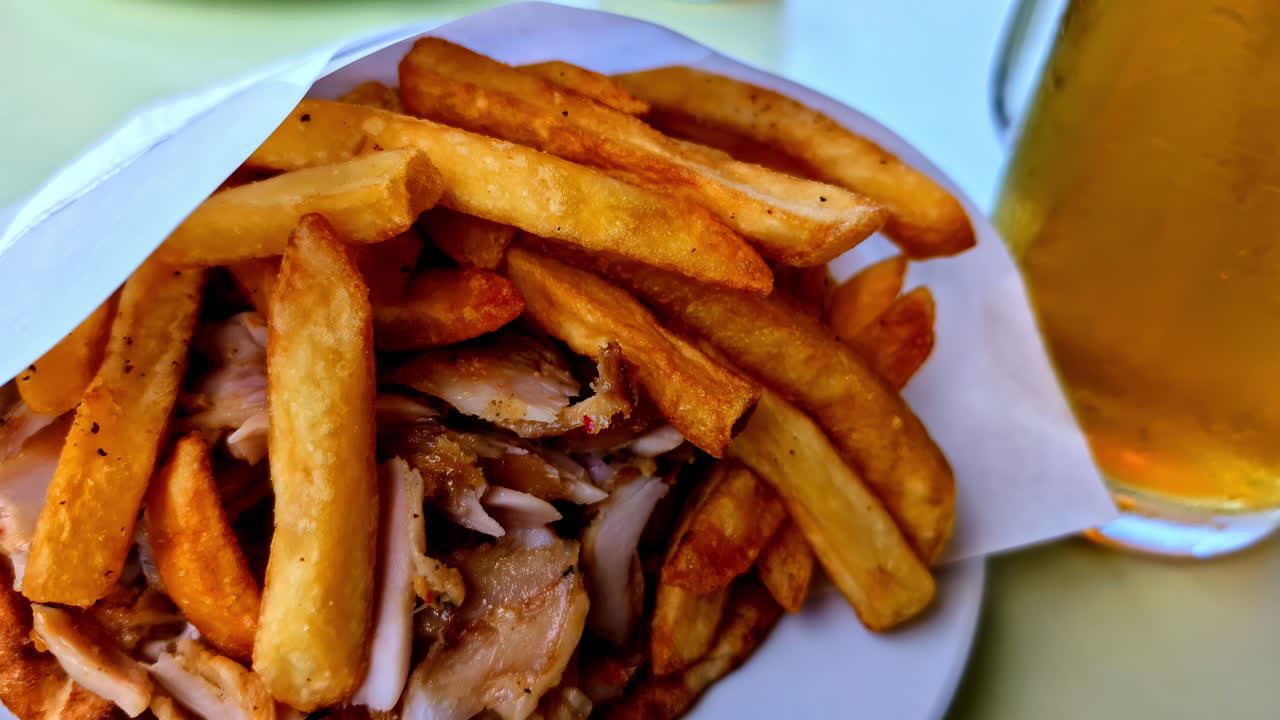 Delicious Gyro with Fries and Beer