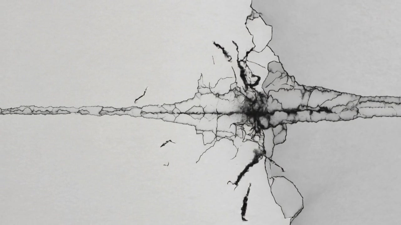Central ink stain darkening and spreading after nick, forming branching veins by paper absorption