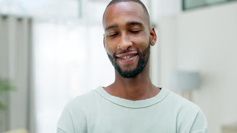 Happy,-relax-and-face-of-a-black-man-in-home