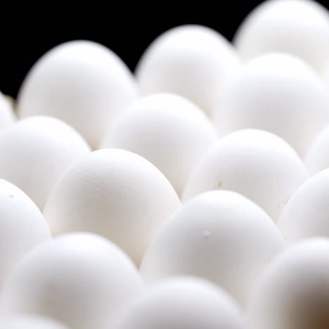 close-up of packed chicken eggs. white eggs in carton box.