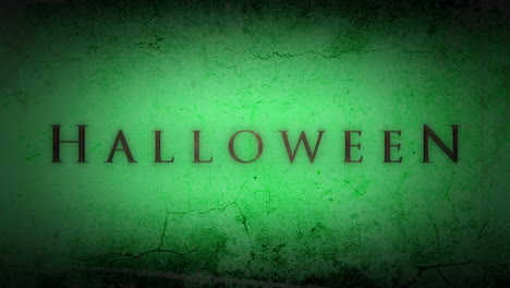 halloween on dark green grunge wall