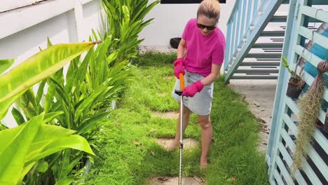 woman gardening in backyard