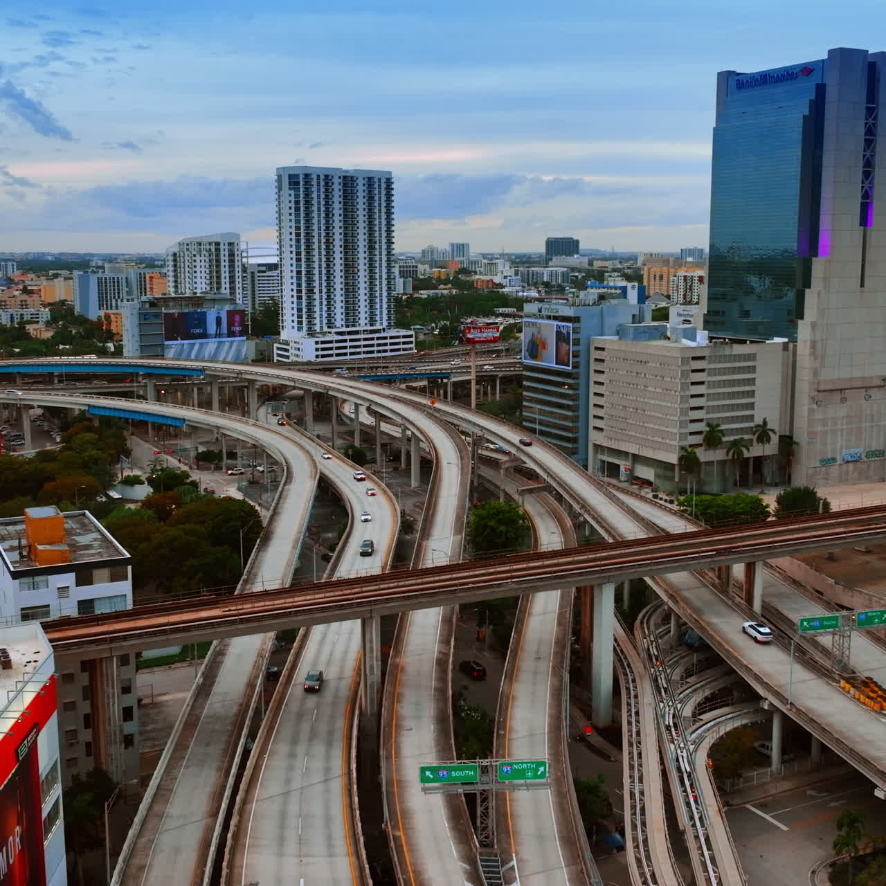 System of speedways in the city downtown. View on the cityscape of Miami, Florida, USA from top.