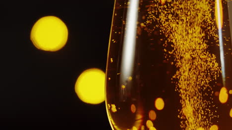 champagne in a glass with sparkling bubbles