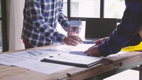 engineer talking with his client and shake hands.