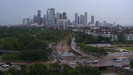 establishing shot of downtown houston, texas and allen parkway street