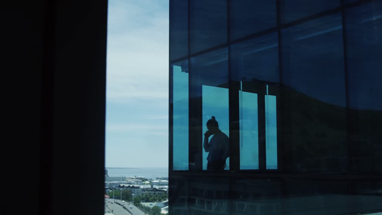 Business executive talking on mobile phone