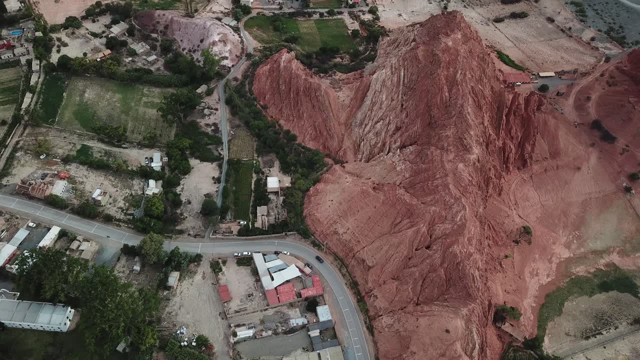 Purmamarca City, Argentina. Birdseye Drone Aerial View of Road by Seven Colors Hill in Jujuy Province