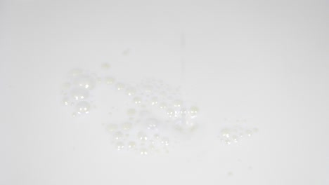Pouring fresh milk in super slow motion 4k