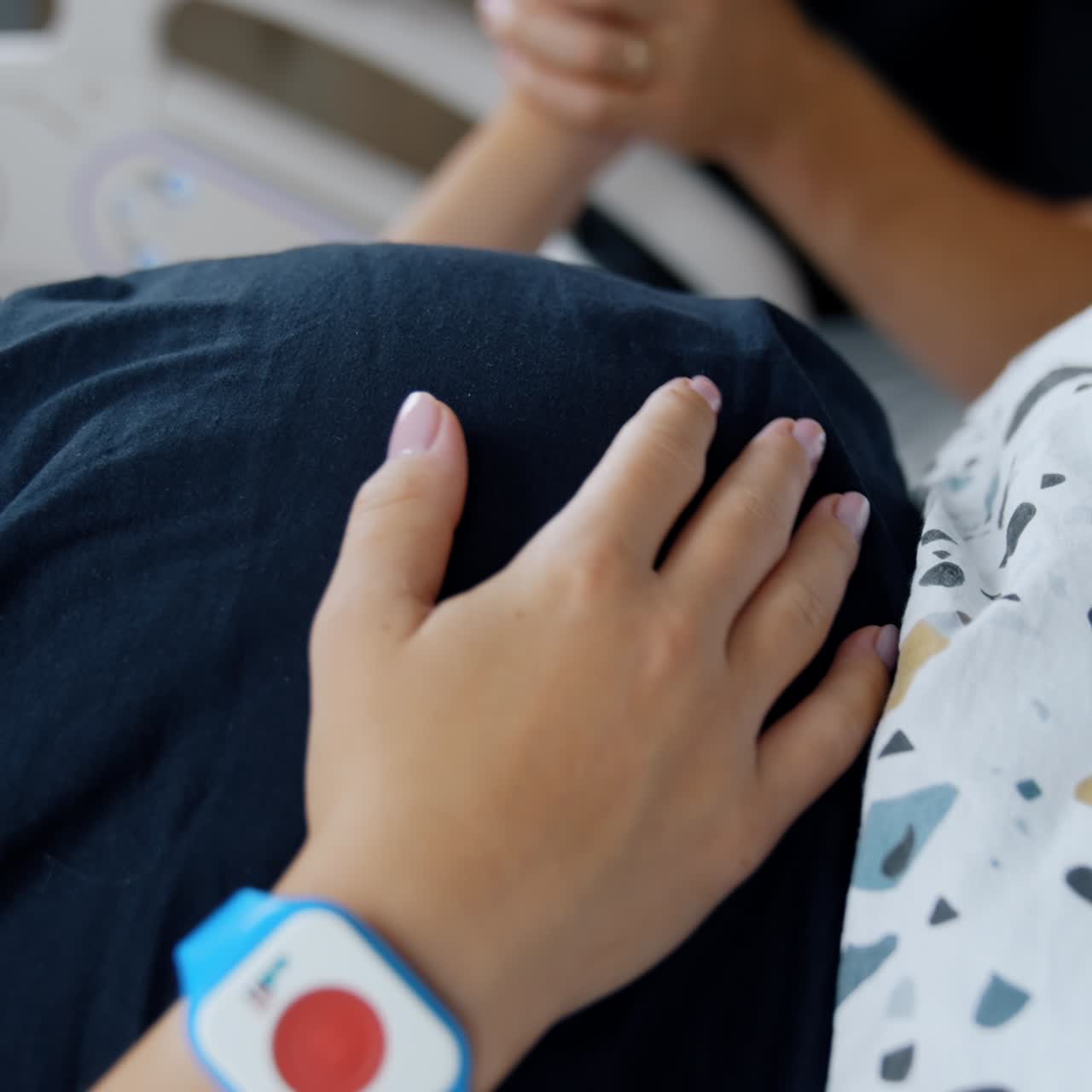 Young husband holding hand of pregnant woman. Pregnant woman supporting by husband