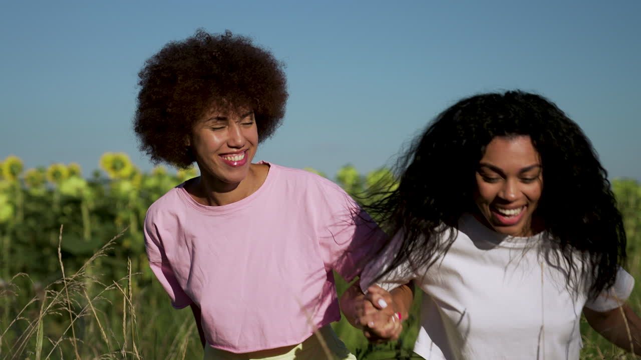 Women in a sunflower field