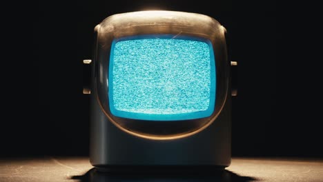 retro tv, vintage television in a nostalgic setup, a retro tv displays grain on screen, scary halloween night device good for chroma key and green screen. high quality 4k footage