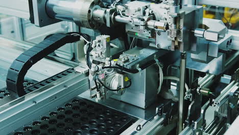 industrial setup robot for electronics factory, advanced robotic machine manufacturing parts in an automated assembly line