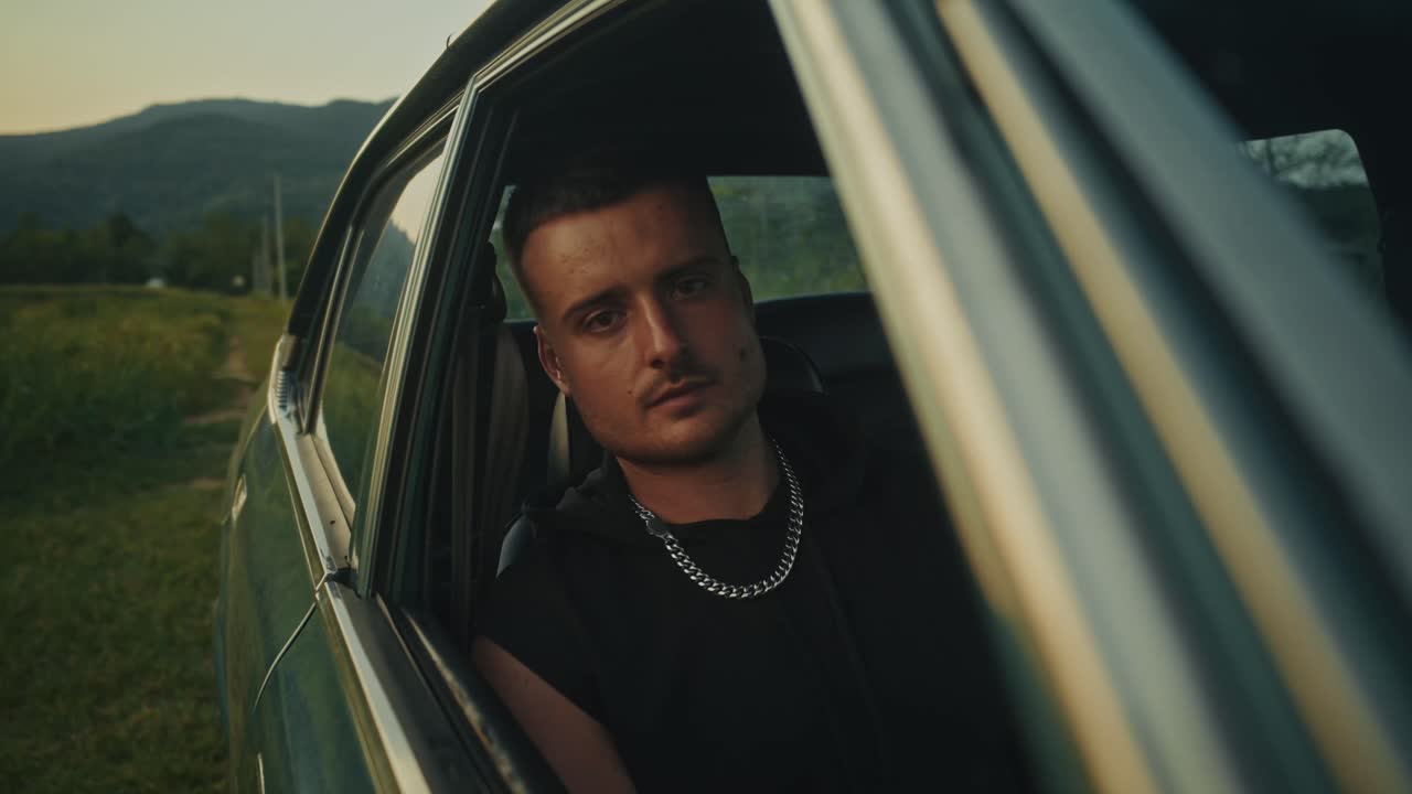 Man in a vintage car