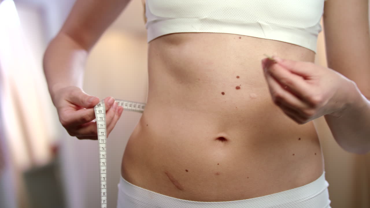 Woman using measuring tape