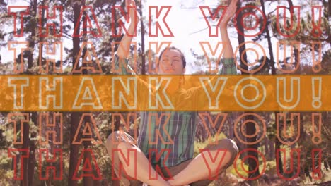 Animation-of-thank-you-text-in-repetition-with-orange-stripe-over-woman-practicing-yoga