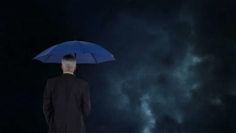 businessman with umbrella during thunder