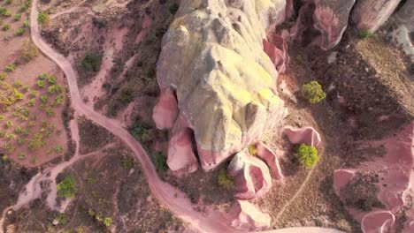 Cappadocia,-Turkey,-Birdseye-Aerial-View-of-Red-Sandstone-Formations-and-Landscape