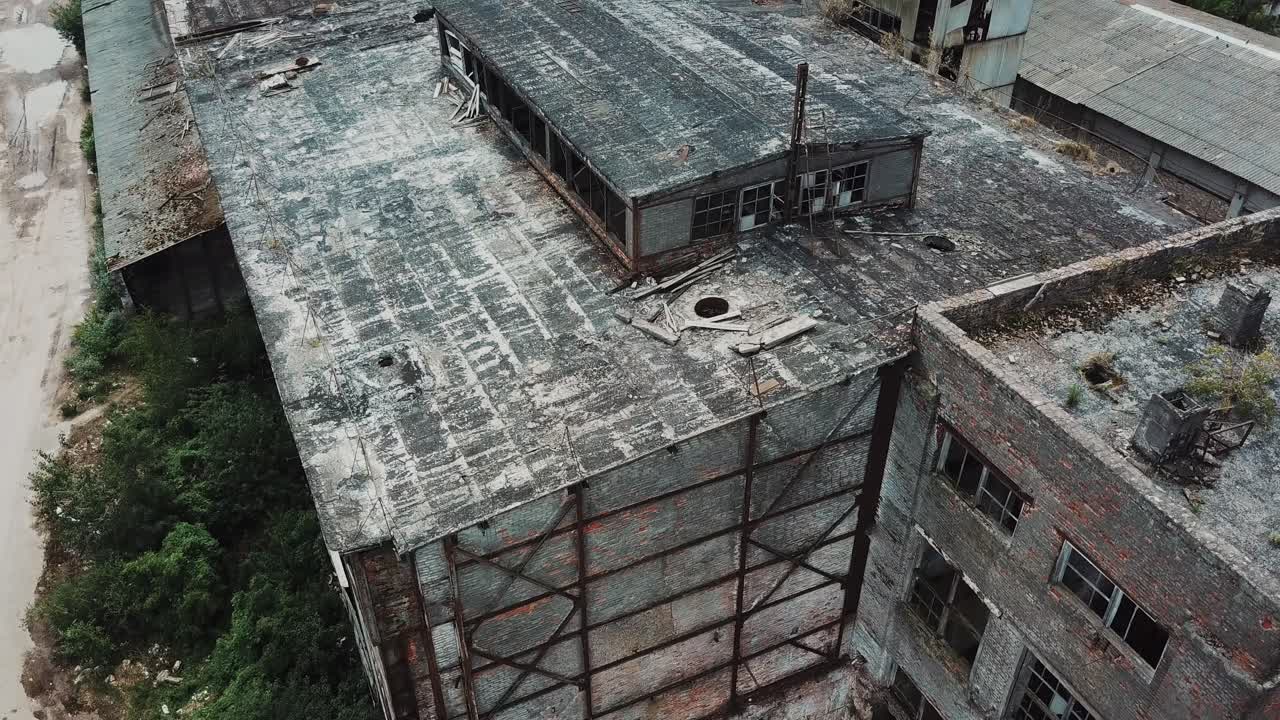 Abandoned ruined industrial factory building, ruins and demolition concept. Aerial view