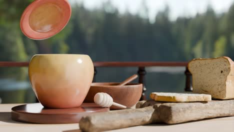 honey pouring into an apple-shaped honey pot