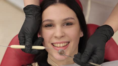 a cheerful and happy patient in a dental chair, eagerly ready for an important checkup with various dental tools