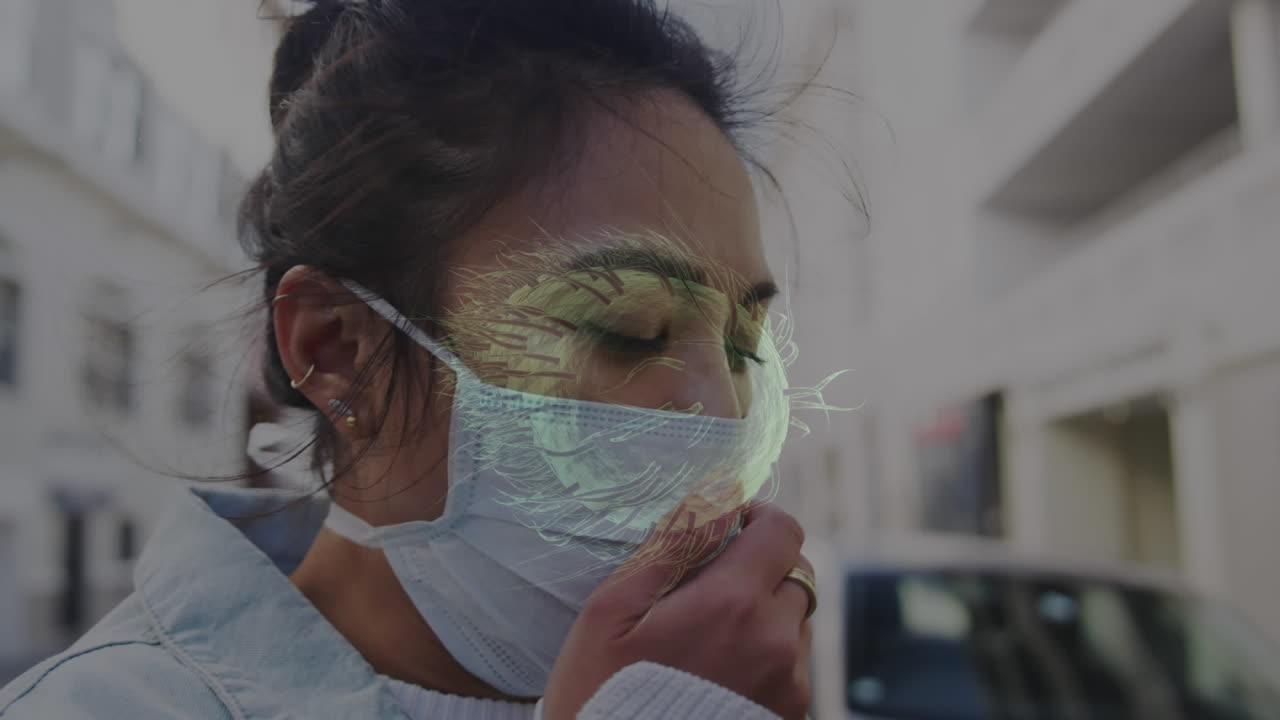 코로나 19 세포가 얼굴 마스크를 입은 여성을 가로질러 움직이는 애니메이션