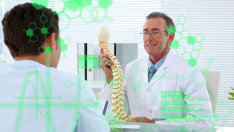 animation of processing data over diverse male doctor and patient discussing spine