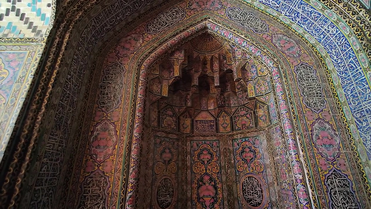 Intricate Islamic Tilework and Calligraphy in a Historic Mosque Archway