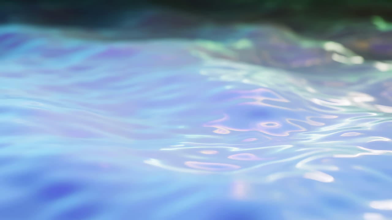 抽象的な玉虫色の液体表面、穏やかな波紋