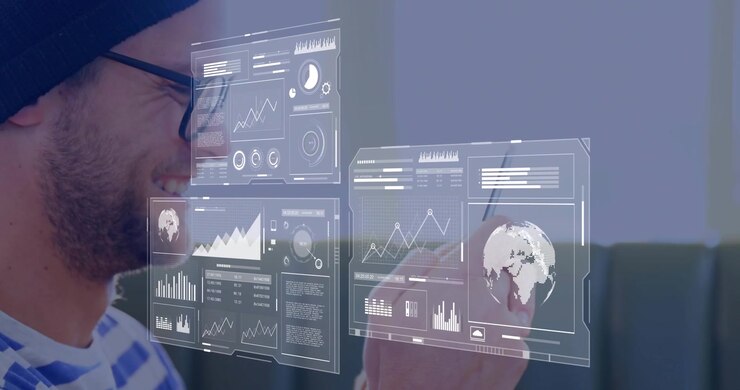 Tech designer on couch raising phone and stylus, tapping AR charts and globe, analyzing data