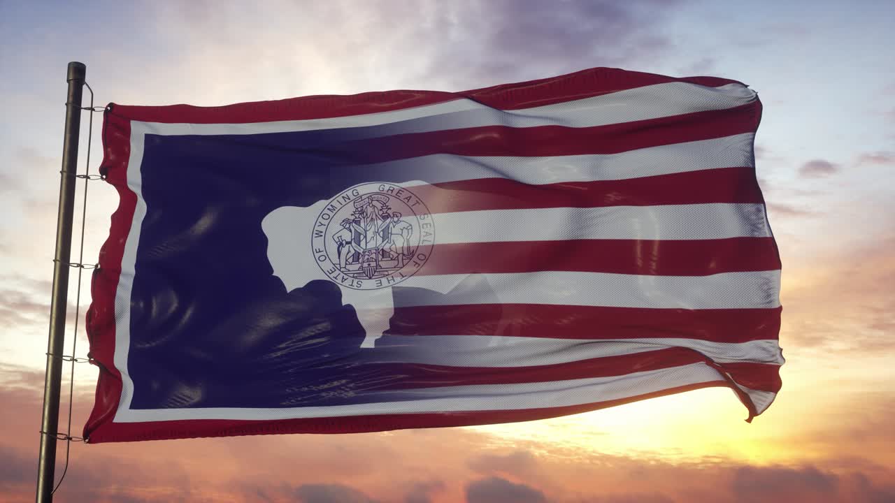 Bandiera del Wyoming e degli Stati Uniti sul pennone. Bandiera mista USA e Wyoming che fluttua nel vento