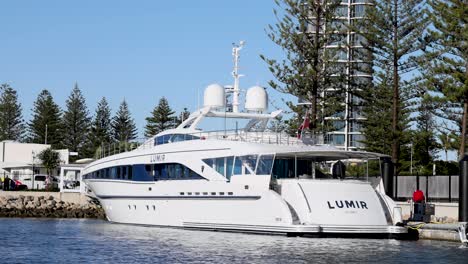 a yacht named lumir docking at gold coast