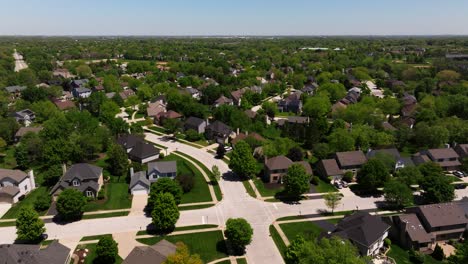 scenic drone shot above suburban neighborhood. residential houses usa