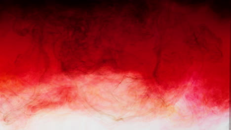 dark red ink disperses to light gradient to white on abstract background