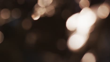 Video-of-flickering-yellow-bokeh-spots-of-light-with-copy-space