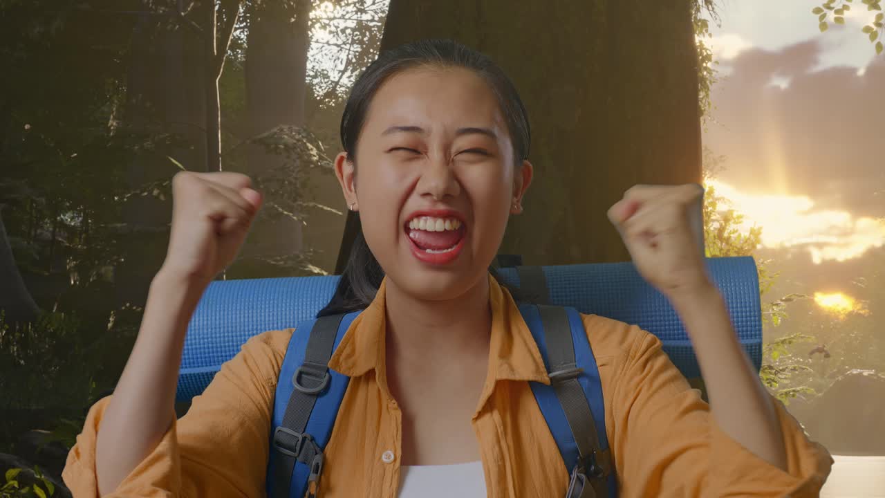 Excited woman hiking in nature