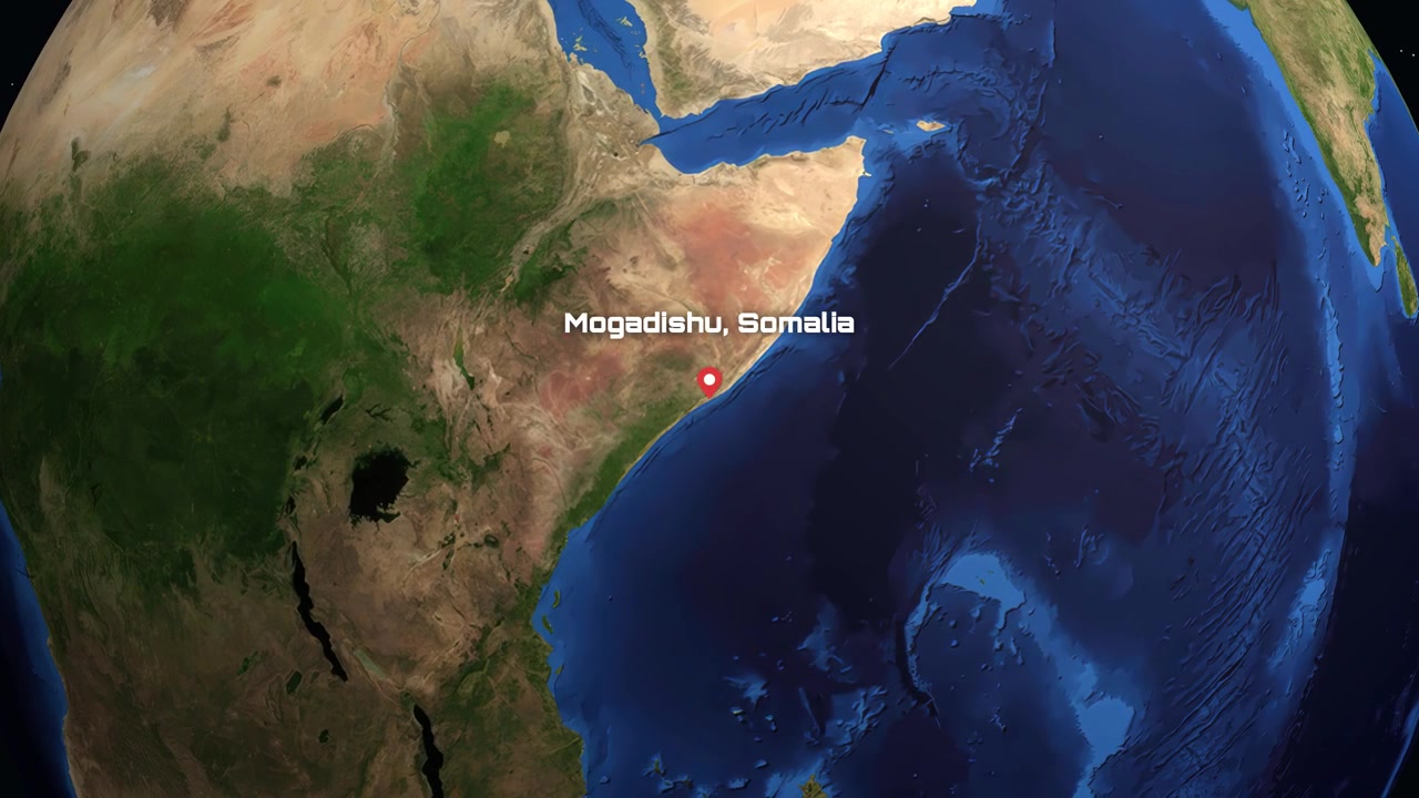 Animazione digitale si ingrandisce dallo spazio profondo fino al Corno d'Africa, individuando Mogadiscio, Somalia