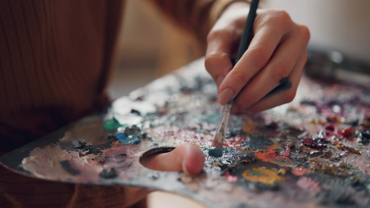 Artist painting flowers