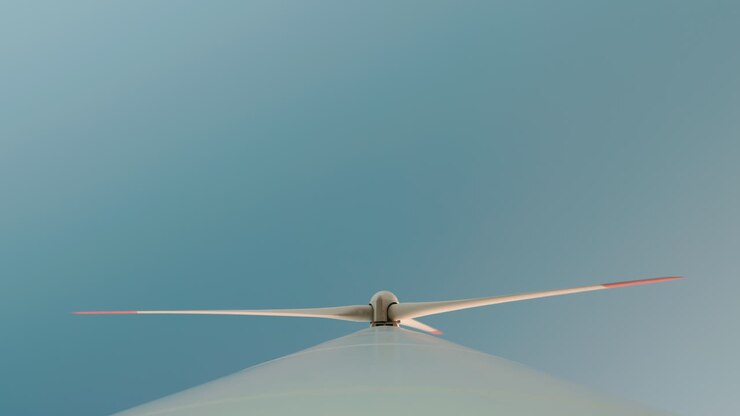 Wind Turbine Against Blue Sky