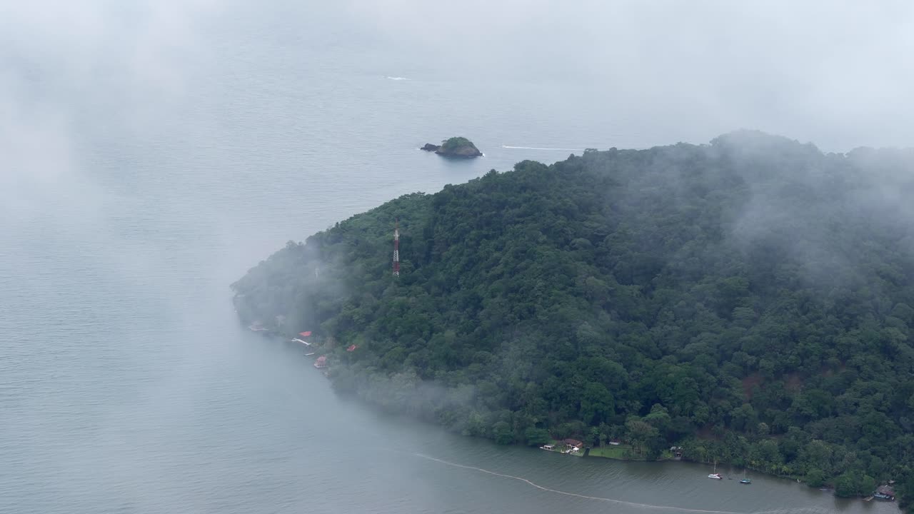 Between the clouds, Mountains and beaches in the bay of Portobelo Panama. Aerial View 4K