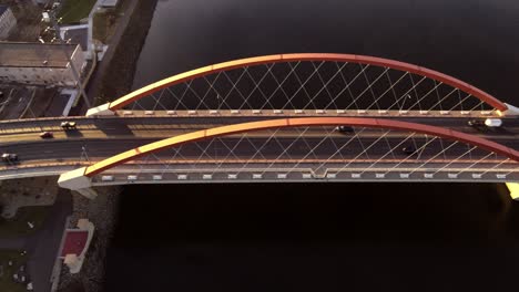 cinematic aerial shot over hastings bridge, minnesota, just before sunset